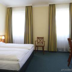 Отель Intercityhotel Munchen Мюнхен комната для гостей фото 3