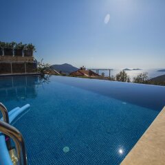 Villa Horizon by Akdenizvillam Турция, Калкан - отзывы, цены и фото номеров - забронировать отель Villa Horizon by Akdenizvillam онлайн бассейн фото 2