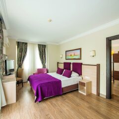 Отель Crystal Aura Beach Resort & Spa – All Inclusive комната для гостей фото 7