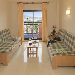 Отель Fuengirola Beach Apartamentos Turisticos комната для гостей