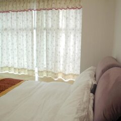 Апартаменты Shenzhen Xin Phoenix Gang Ao 8 Apartment комната для гостей фото 2