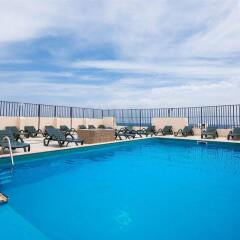 Отель Damiani Apartments Мальта, Буджибба - отзывы, цены и фото номеров - забронировать отель Damiani Apartments онлайн бассейн