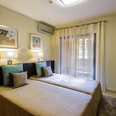 Апартаменты Amendoeira Golf Resort - Apartments and villas комната для гостей