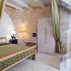 Le Alcove - Luxury Hotel nei Trulli Альберобелло комната для гостей фото 2