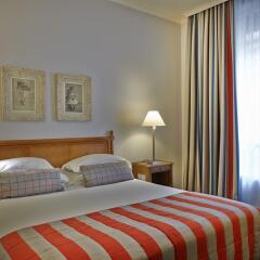 Отель Royal Hotel Paris Champs Elysées Франция, Париж - отзывы, цены и фото номеров - забронировать отель Royal Hotel Paris Champs Elysées онлайн комната для гостей фото 3