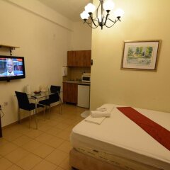 Апартаменты Loui M Apartments Хайфа комната для гостей фото 4