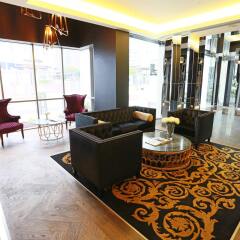 Alex Perry Hotel & Apartments интерьер отеля