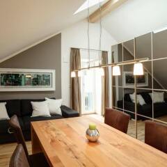 Апартаменты Paleo Finest Serviced Apartments Мюнхен комната для гостей фото 2