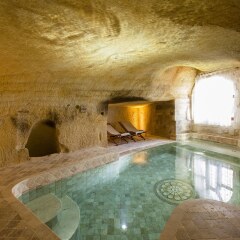 Отель Kayakapi Premium Caves Cappadocia бассейн фото 2