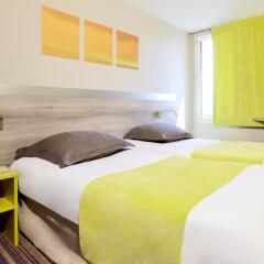 Hotel Kyriad Lyon Est - Saint Bonnet de Mure комната для гостей