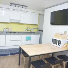 Отель New Sun Guesthouse Myeongdong в номере