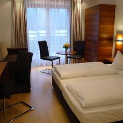Boutique Hotel & Apartments Am Essigmanngut Аниф комната для гостей фото 5