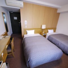 Отель Route-Inn Oita Ekimae Ойта сейф в номере