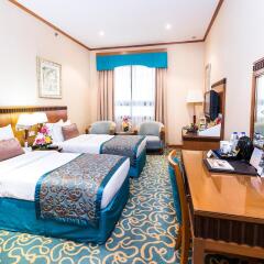 Отель Golden Tulip Al Barsha комната для гостей фото 4