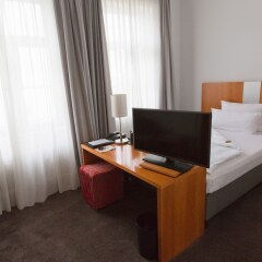 Отель Astor & Aparthotel Германия, Кёльн - отзывы, цены и фото номеров - забронировать отель Astor & Aparthotel онлайн удобства в номере фото 2