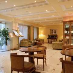 Отель Athens Atrium Hotel and Suites Греция, Афины - 2 отзыва об отеле, цены и фото номеров - забронировать отель Athens Atrium Hotel and Suites онлайн интерьер отеля фото 2