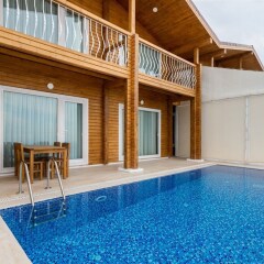 Villa Mimoza by Akdenizvillam Турция, Калкан - отзывы, цены и фото номеров - забронировать отель Villa Mimoza by Akdenizvillam онлайн бассейн фото 2