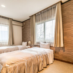 Petit Hotel Enchante Хакуба комната для гостей