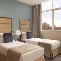 Отель Ramada Corniche 4* Номер Делюкс фото 6