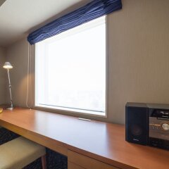 Hotel Associa Toyohashi сейф в номере