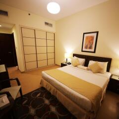 Tulip Hotel Apartments комната для гостей