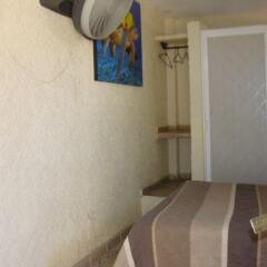 Hotel & Villas Los Pescaditos удобства в номере