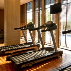 Отель At Mind Serviced Residence фитнесс-зал фото 3