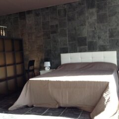 Отель MAANJA Lake Front Suite and Restaurant Саурис комната для гостей