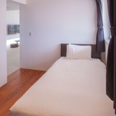Отель Kariyushi Condominium Resort Onna Maeda Base Япония, Центр Окинавы - отзывы, цены и фото номеров - забронировать отель Kariyushi Condominium Resort Onna Maeda Base онлайн комната для гостей фото 2