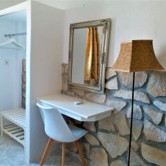 Отель Atalos Suites удобства в номере