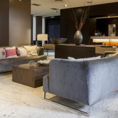 AC Hotel Ciudad de Sevilla by Marriott интерьер отеля