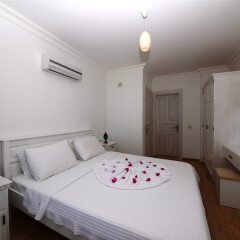 Villa Yali by Akdenizvillam Турция, Калкан - отзывы, цены и фото номеров - забронировать отель Villa Yali by Akdenizvillam онлайн комната для гостей фото 2