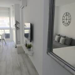 Отель Manantiales Vistasol Loft Торремолинос комната для гостей