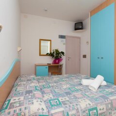Hotel Benvenuti Гаттео-а-Маре комната для гостей
