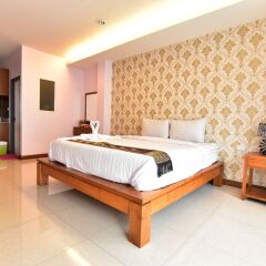 Апартаменты Kaewfathip Apartment Паттайя комната для гостей фото 3
