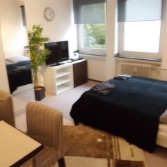Отель Star Apartments Cologne - Ecke Brunostrasse Германия, Кёльн - отзывы, цены и фото номеров - забронировать отель Star Apartments Cologne - Ecke Brunostrasse онлайн комната для гостей фото 2