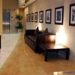Отель Golden Tulip Suites Dubai интерьер отеля