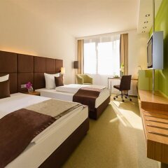 Отель Dorint Main Taunus Zentrum Frankfurt/Sulzbach комната для гостей фото 2