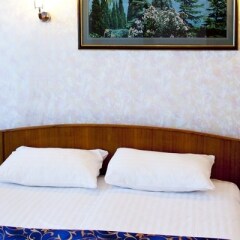 Гостиница Кирова (г.Ялта) комната для гостей фото 2