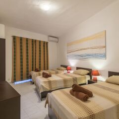Отель Fleur 3 bedroom apartment Sliema Мальта, Слима - отзывы, цены и фото номеров - забронировать отель Fleur 3 bedroom apartment Sliema онлайн комната для гостей фото 3