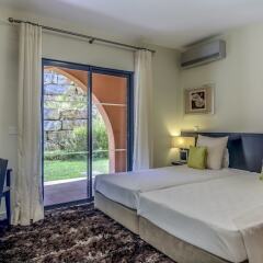 Апартаменты Amendoeira Golf Resort - Apartments and villas комната для гостей фото 13
