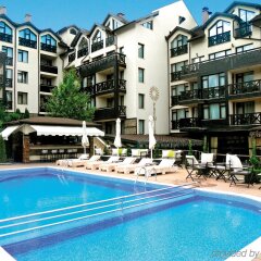 Отель Premier Luxury Mountain Resort Болгария, Банско - отзывы, цены и фото номеров - забронировать отель Premier Luxury Mountain Resort онлайн бассейн фото 3