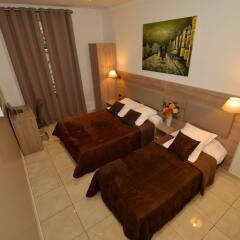 Hotel Parisien комната для гостей