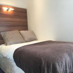 Апартаменты Glasgow Airport Apartments Пейсли комната для гостей фото 4