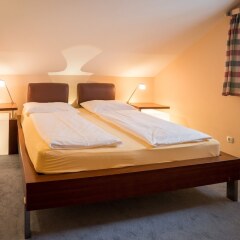 Holiday Apartments by Das Grüne Hotel zur Post - 100 % BIO & Villa Ceconi Зальцбург комната для гостей