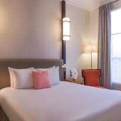 Отель Le Marquis Eiffel 4* Стандартный номер с двуспальной кроватью