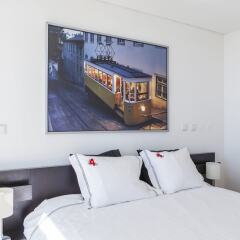 Апартаменты Rent4Rest Lisbon 17th Floor River View Apartment комната для гостей фото 4