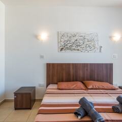 Отель Seashells Self Catering Apartment Мальта, Буджибба - отзывы, цены и фото номеров - забронировать отель Seashells Self Catering Apartment онлайн комната для гостей фото 5