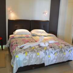 Апартаменты Coconut Bay Penthouse Apartment Ланта комната для гостей фото 2