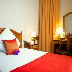Отель Mercure Bologna Centro Болонья сейф в номере